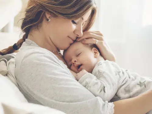 Mother holding baby